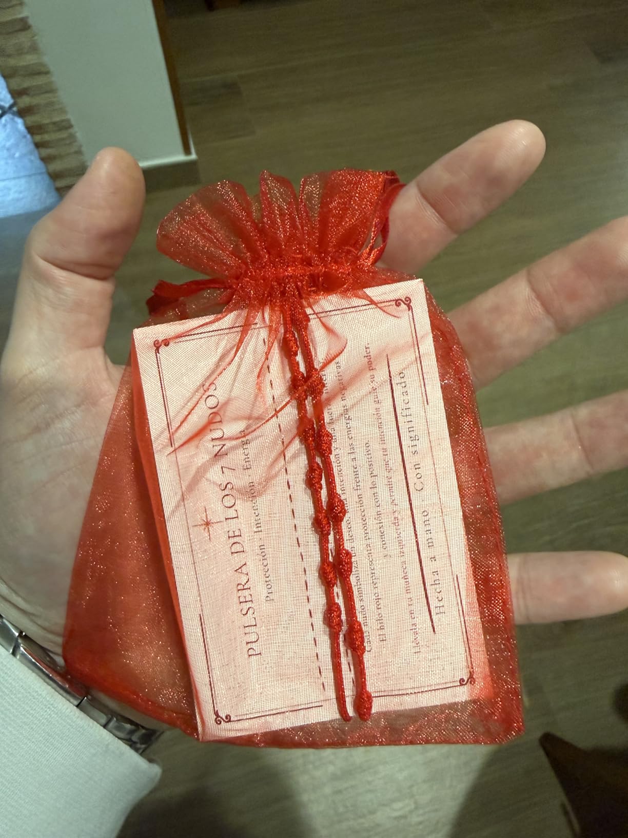 Pack de pulsera de los 7 nudos en bolsa roja